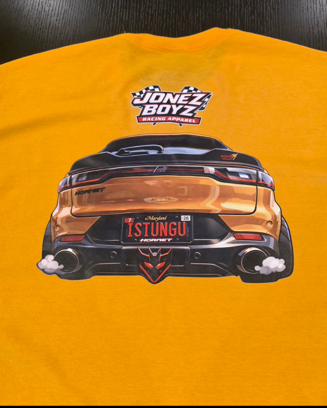Customized t-shirt with your car or bike on the back.